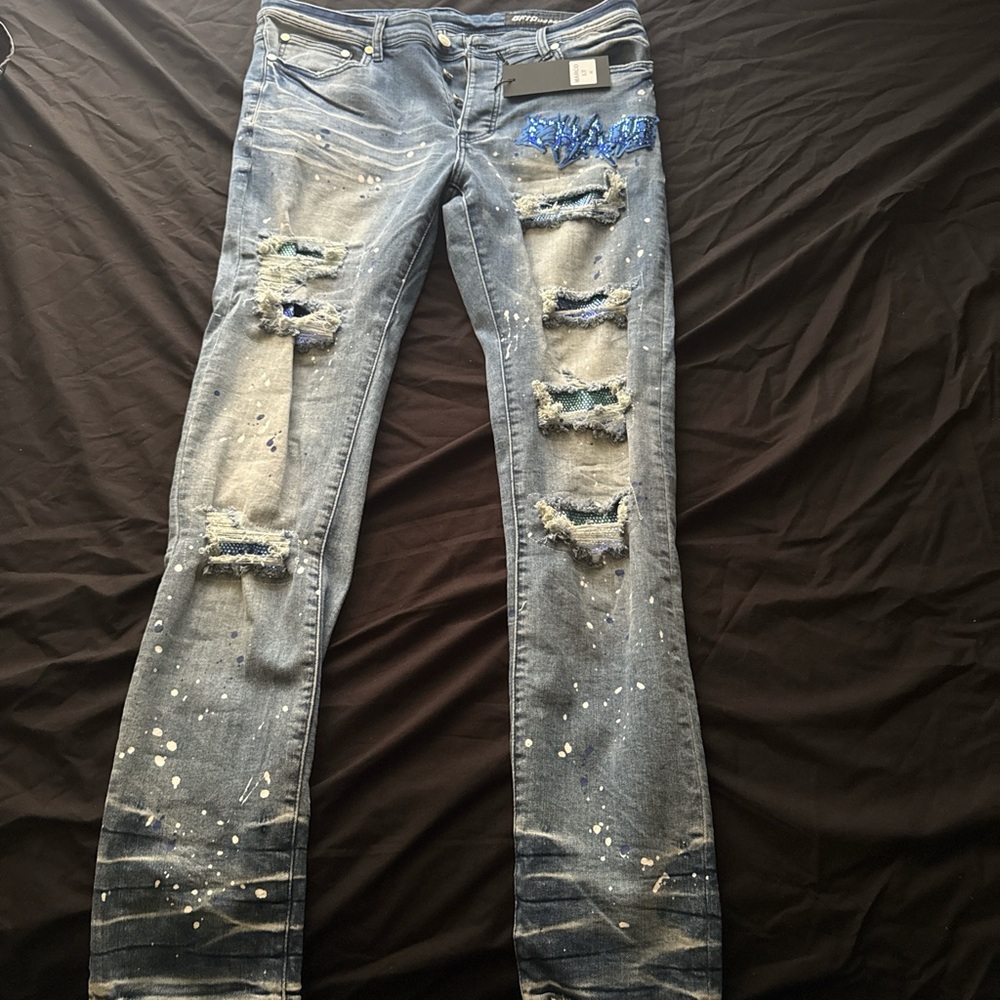 Distressed Blue Jeans